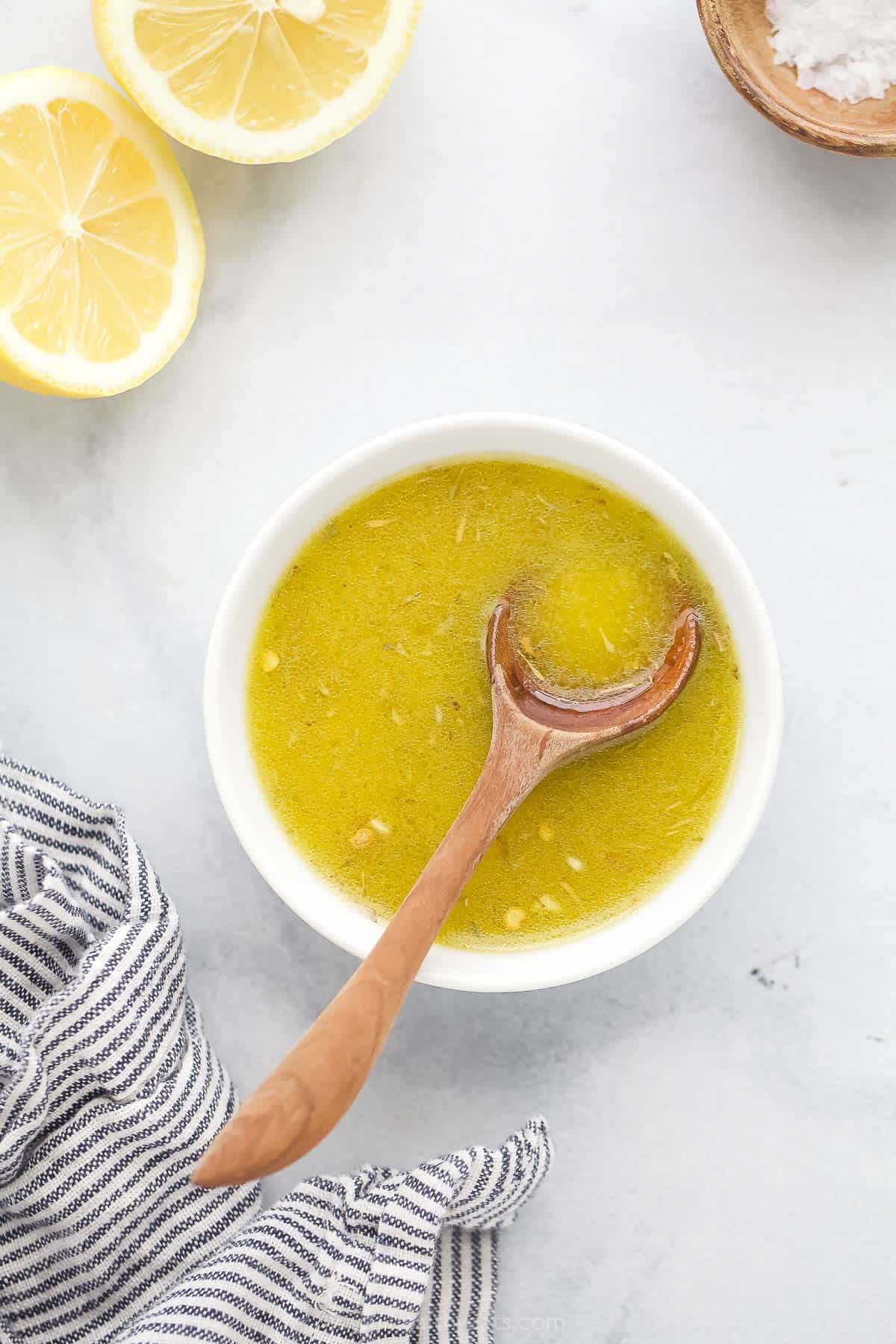 Bowl of tangy lemon vinaigrette.