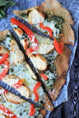 Spice up your pizza night with a Grilled Chicken Pesto Pizza, its the best way to eat pizza! | purewellnessjourneyclub.com