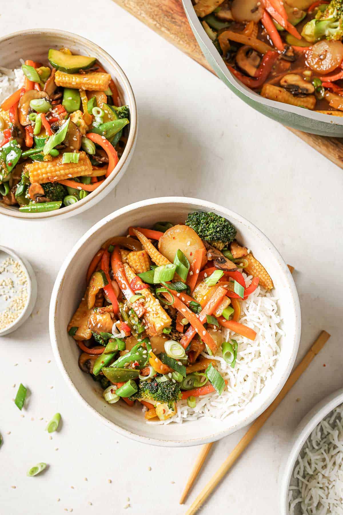 Overhead view of vegetable stir fry in bowl with rice