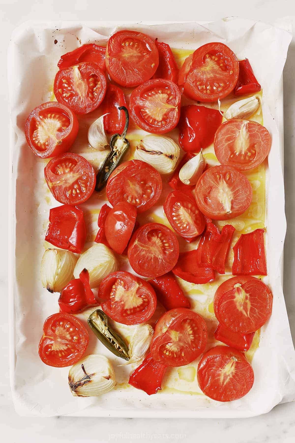 Roasted veggies in the baking tray. 