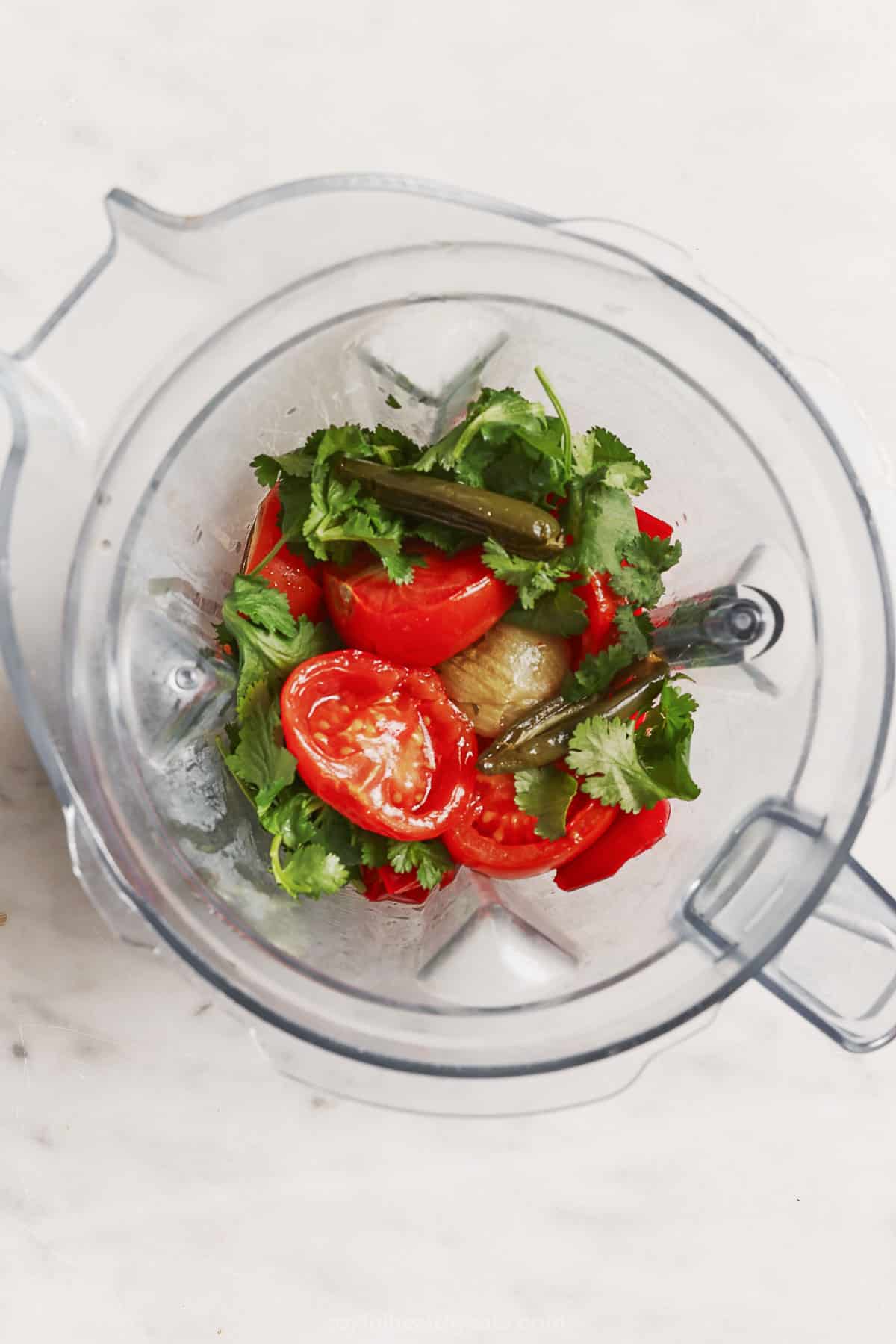 Roasted veggies and cilantro in the food processor. 