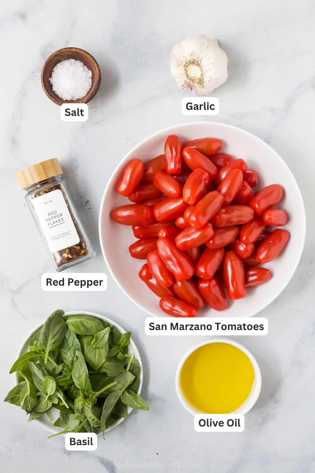 Overhead view of ingredients for pasta sauce recipe
