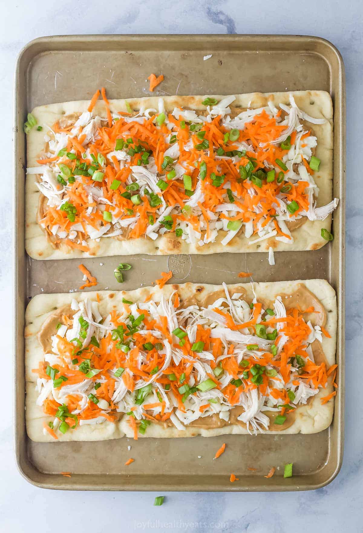 Adding the veggies before baking. 