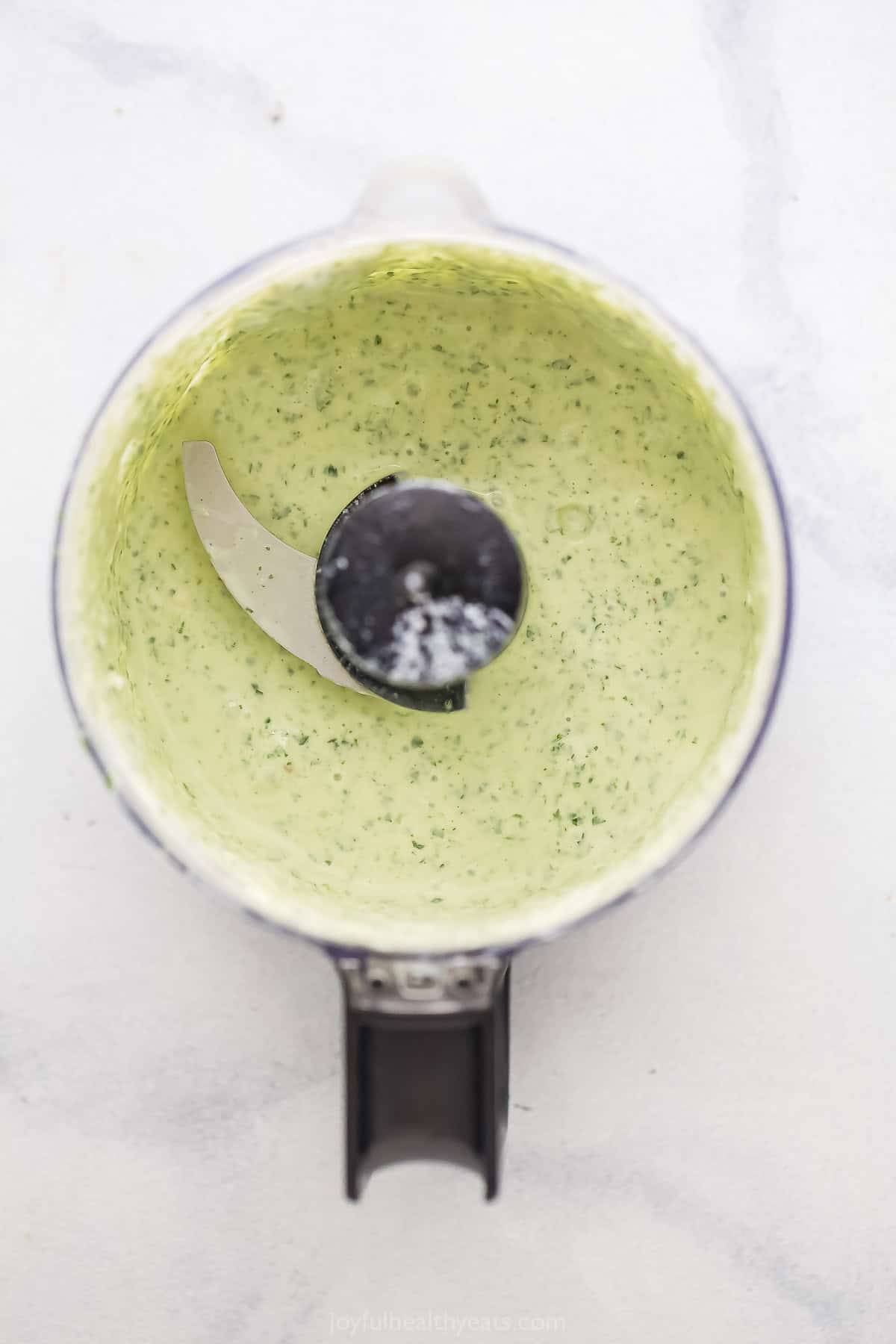 Blended crema in the food processor.