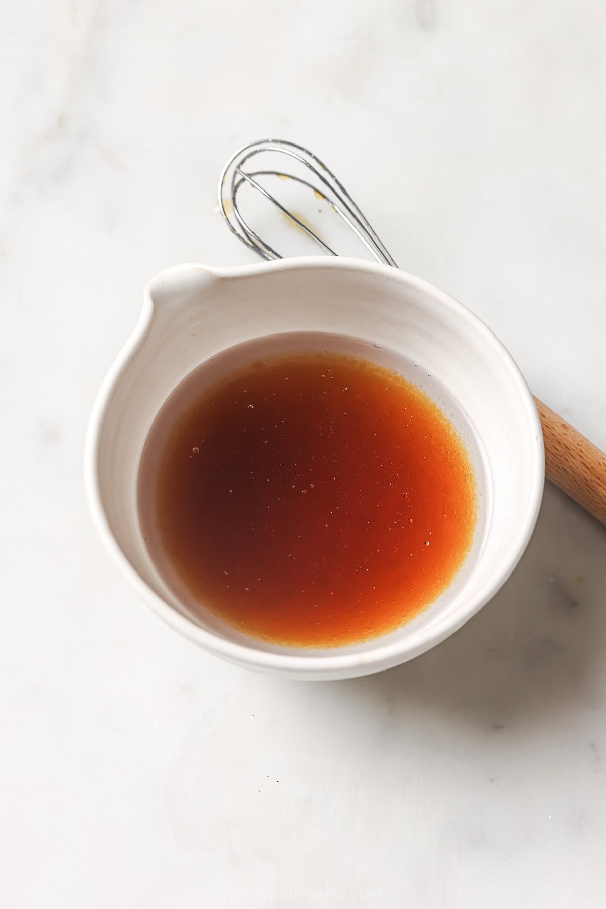 Liquid ingredients for granola in bowl