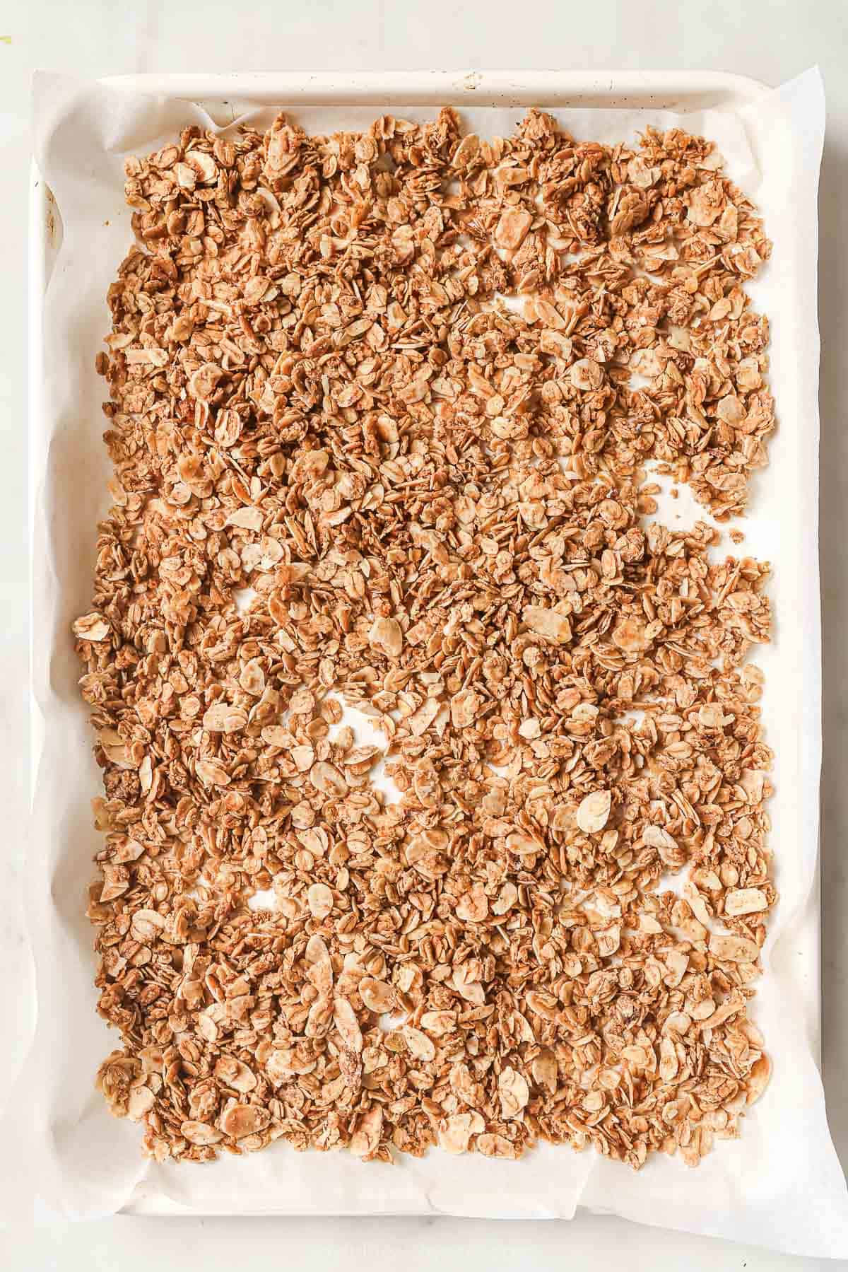 Overhead view of homemade granola on pan