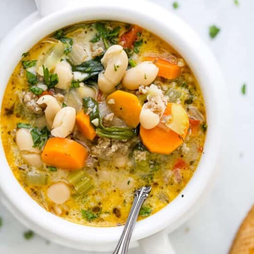 close up of a bowl filled with creamy tuscan white bean soup
