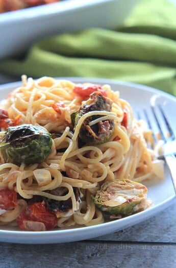 An easy & fancy Caramelized Brussels Sprouts Pancetta Pasta with Creamy Goat Cheese Sauce | purewellnessjourneyclub.com