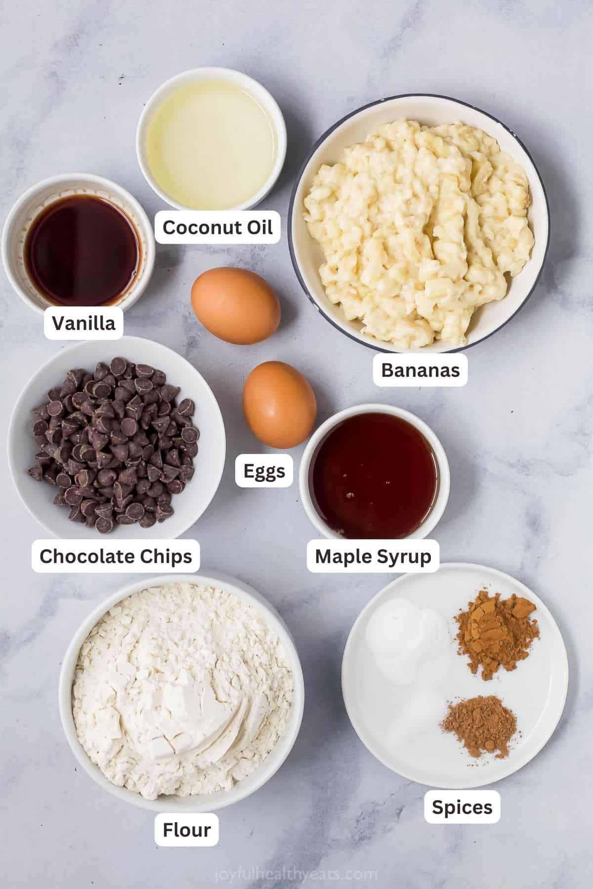 This fluffy banana chocolate chip bread recipe with cinnamon is naturally sweetened with maple syrup for the perfect morning bite. Chocolate Chip Banana Bread Ingredients Labeled