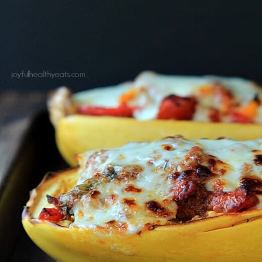 An easy healthy spanish inspired weeknight dinner, Chorizo Kale & Pepper Stuffed Spaghetti Squash Boats! | purewellnessjourneyclub.com