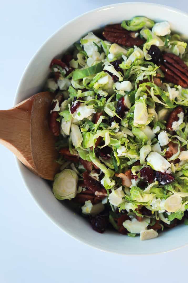 You need this Salad in your life & on the table! Shaved Brussels Sprouts Harvest Salad with Hard Apple Cider Vinaigrette | purewellnessjourneyclub.com #thanksgiving #healthy 