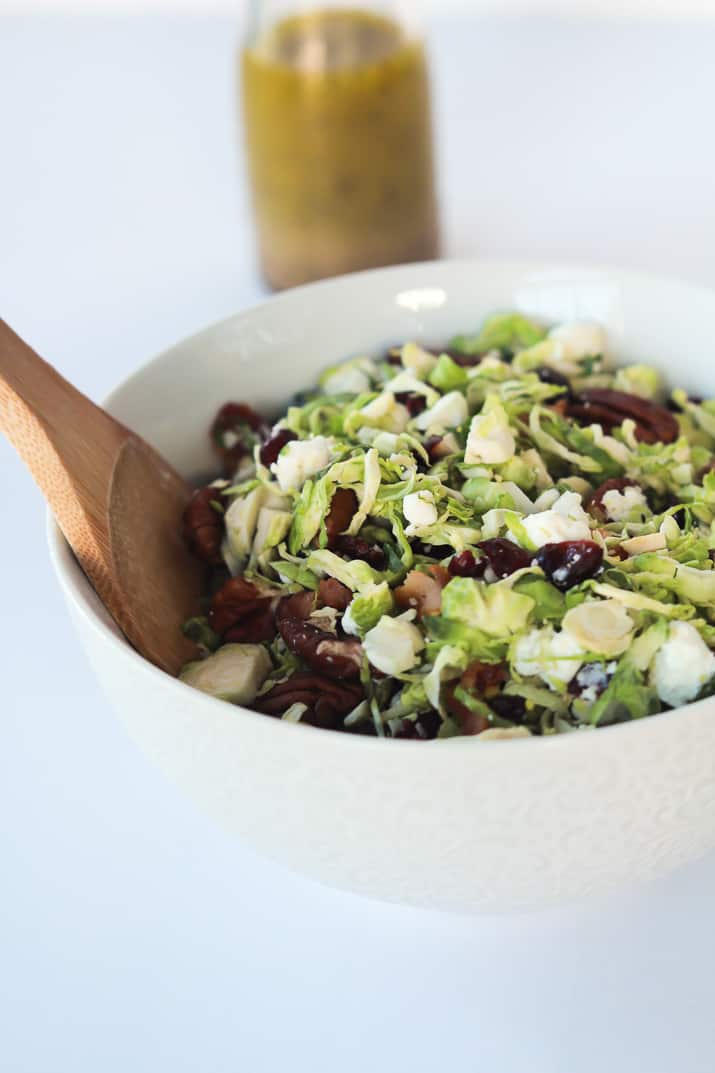 You need this Salad in your life & on the table! Shaved Brussels Sprouts Harvest Salad with Hard Apple Cider Vinaigrette | purewellnessjourneyclub.com #thanksgiving #healthy