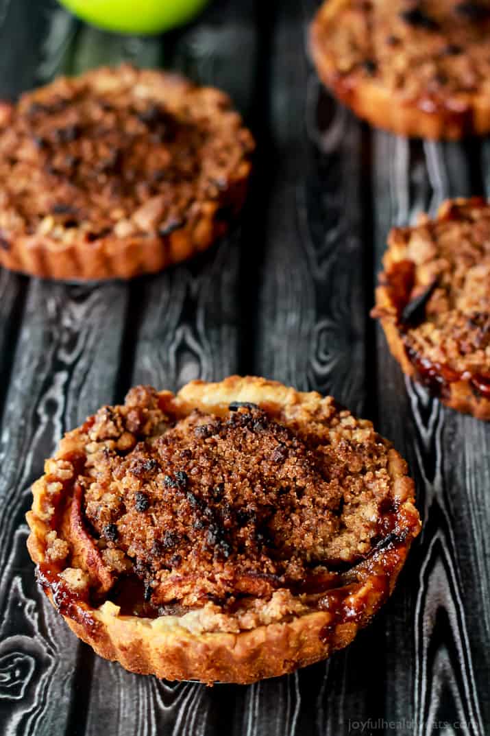 Built in portion control makes these Mini Apple Pie Tartlets with Pecan Streusel extra irresistible! The ultimate fall dessert! | purewellnessjourneyclub.com 