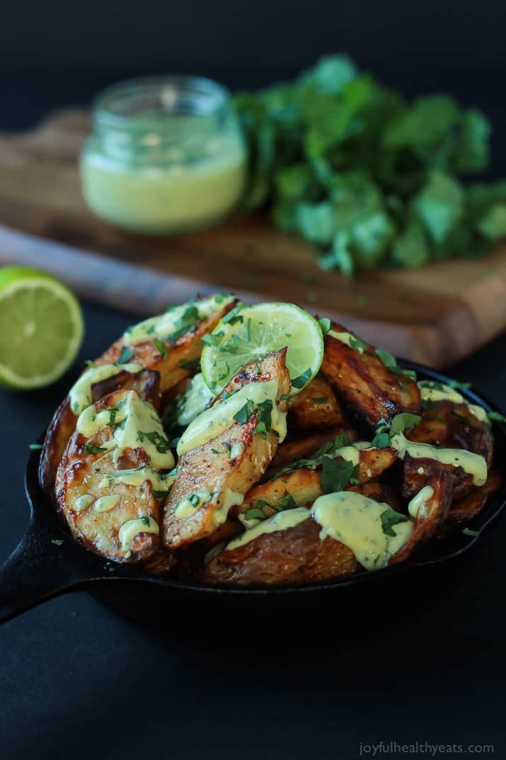 These Oven Roasted Potato Wedges actually turn out crispy, and the Avocado Wasabi Aioli rocks! | purewellnessjourneyclub.com #recipes 