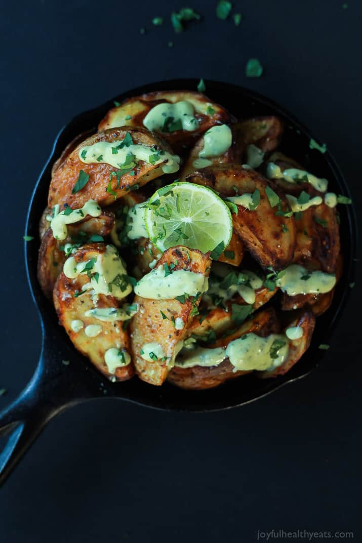 These Oven Roasted Potato Wedges actually turn out crispy, and the Avocado Wasabi Aioli rocks! | purewellnessjourneyclub.com #recipes
