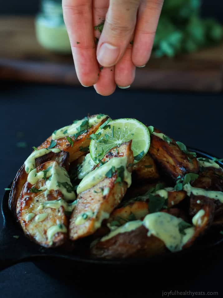 These Oven Roasted Potato Wedges actually turn out crispy, and the Avocado Wasabi Aioli rocks! | purewellnessjourneyclub.com #recipes 