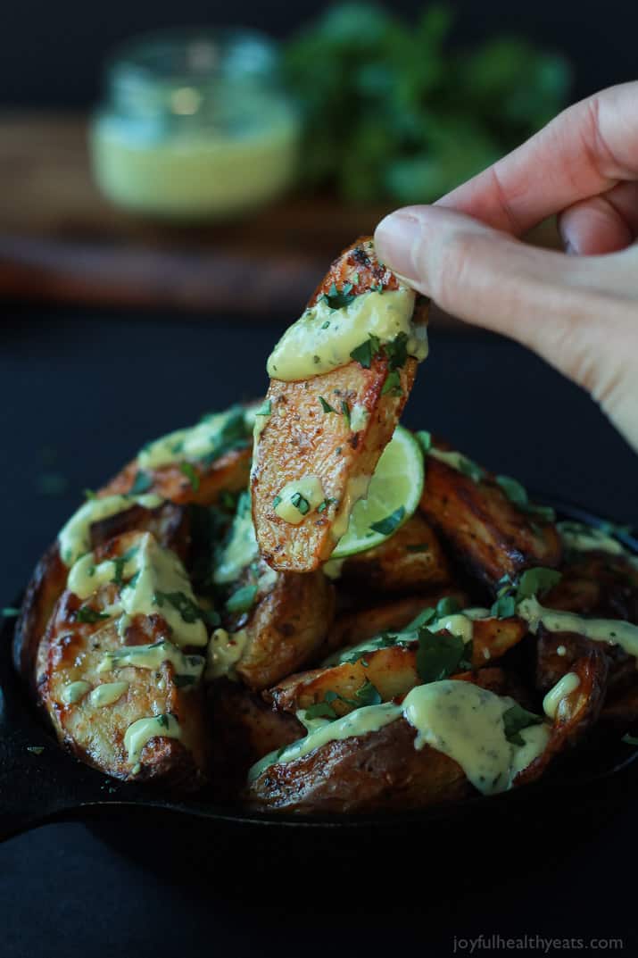 These Oven Roasted Potato Wedges actually turn out crispy, and the Avocado Wasabi Aioli rocks! | purewellnessjourneyclub.com #recipes 