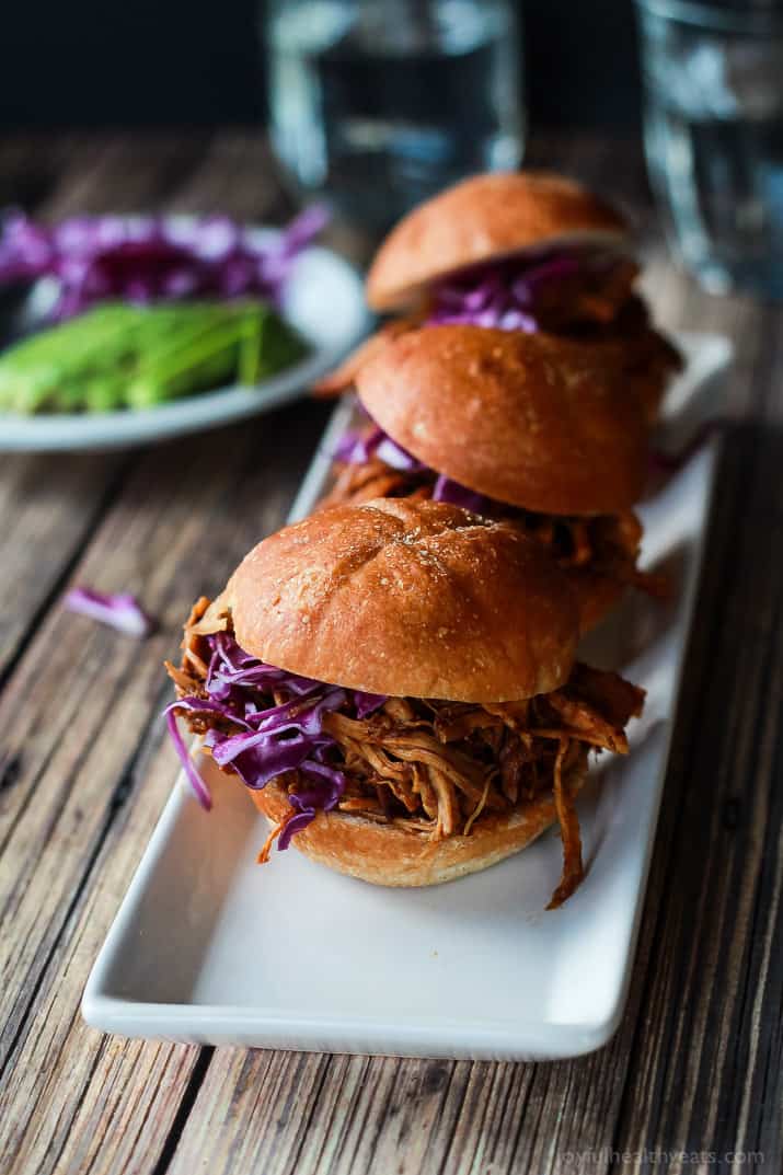 Seriously can't get enough of these! Must make for next party, so easy ... Skinny Pulled Pork Sliders | purewellnessjourneyclub.com 