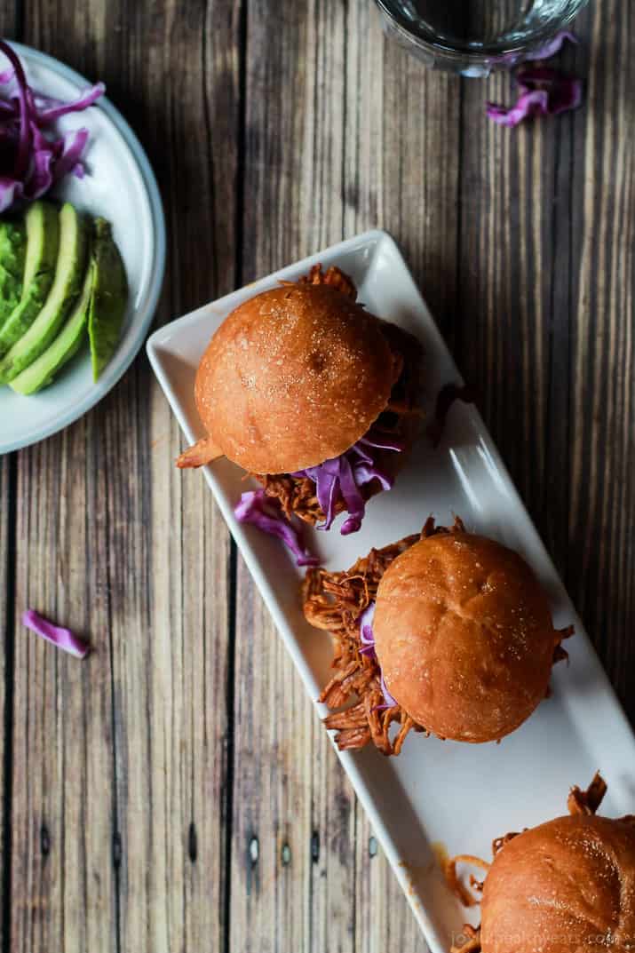 Seriously can't get enough of these! Must make for next party, so easy ... Skinny Pulled Pork Sliders | purewellnessjourneyclub.com 