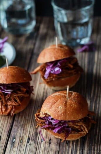 Seriously can't get enough of these! Must make for next party, so easy ... Skinny Pulled Pork Sliders | purewellnessjourneyclub.com