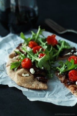 Add this low carb recipe to your collection of 30 minute meals; Pita Pizza that's not shy on flavor. | purewellnessjourneyclub.com #vegetarian #recipes
