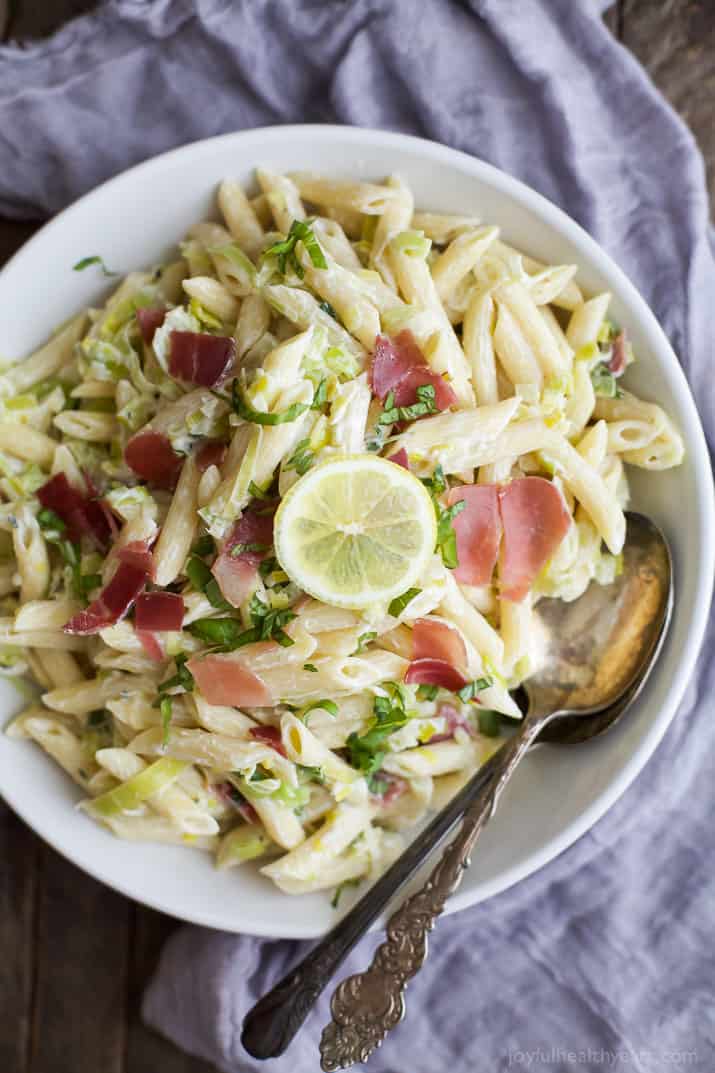 Top view of a bowl of Creamy Lemon Pasta with Prosciutto