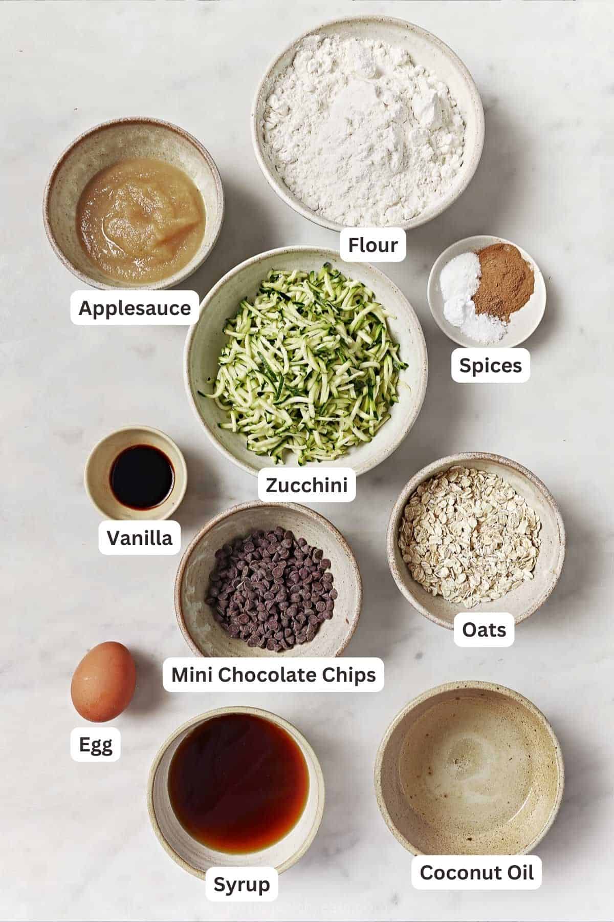 Labeled ingredients for zucchini chocolate chip muffins. 