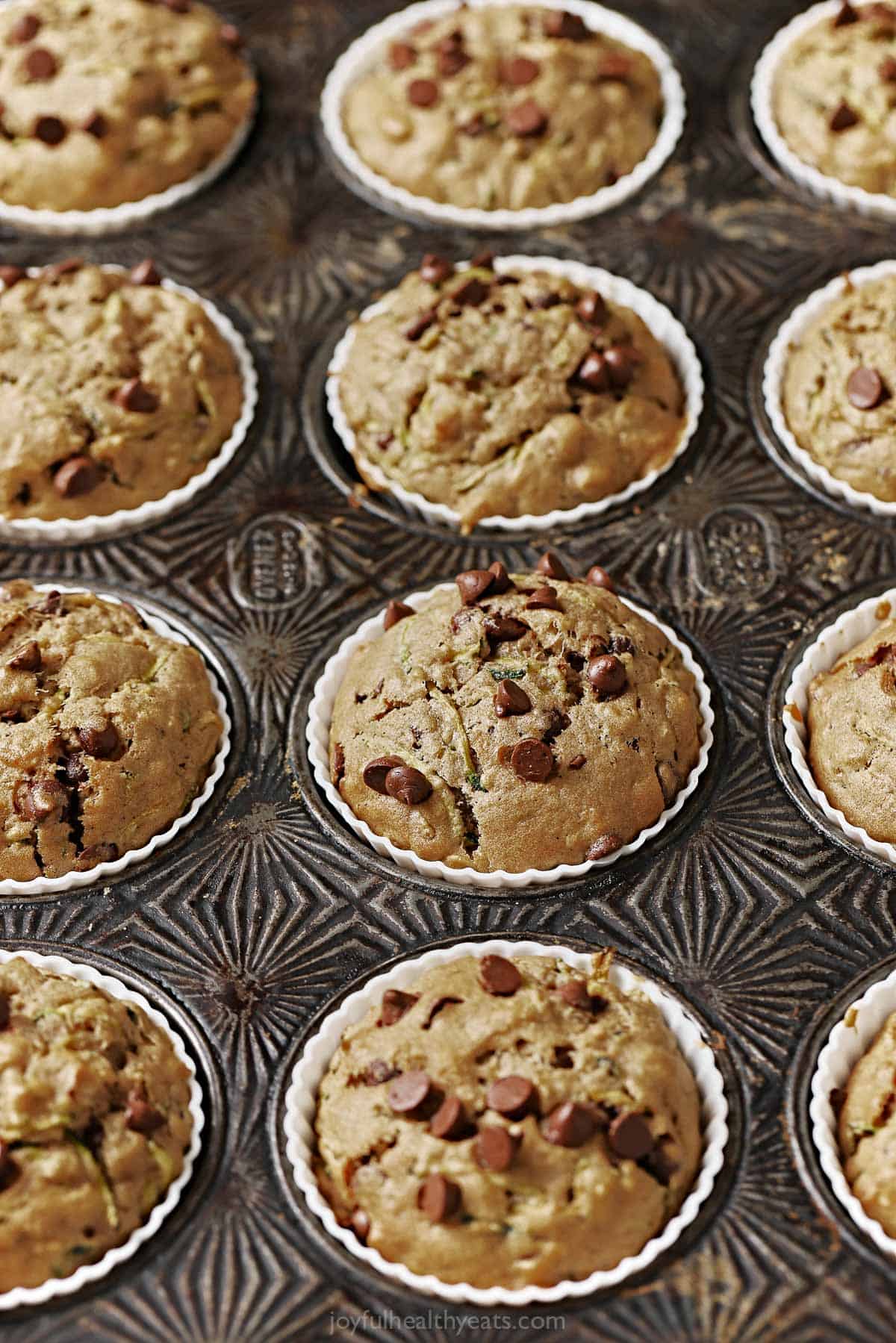 Freshly baked muffins in the tray. 