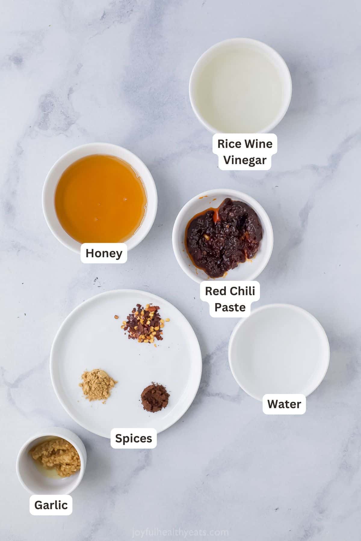 Overhead view of ingredients for sweet chili salmon with labels