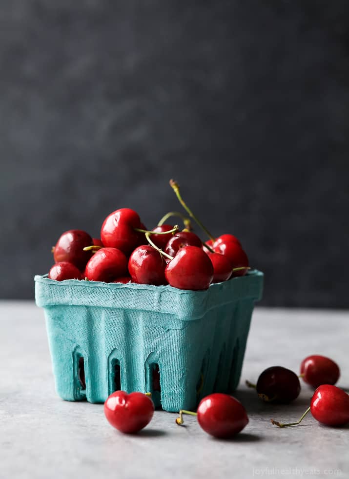 A pint of fresh cherries