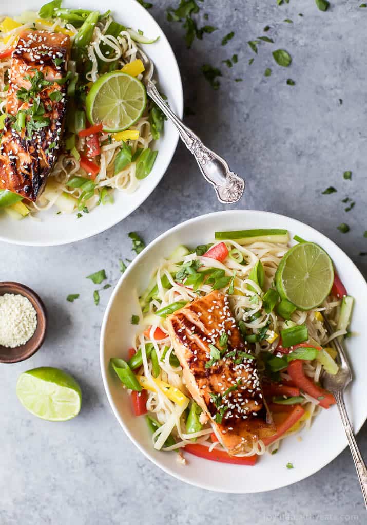 Easy Teriyaki Salmon served on a bed of Asian Noodles made with brown rice noodles, fresh veggies and a homemade Asian Sesame Dressing! A light, simple refreshing recipe for the summer! | gluten free recipes