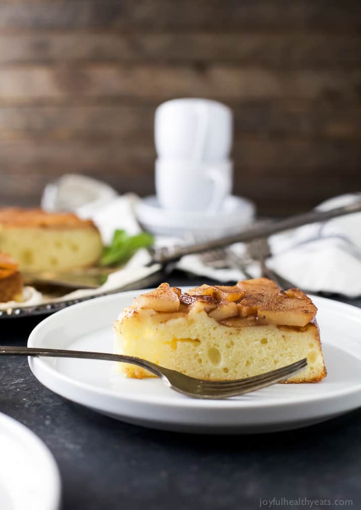 Close-up of a slice of pear upside down cake with a moist, tender crumb. 
