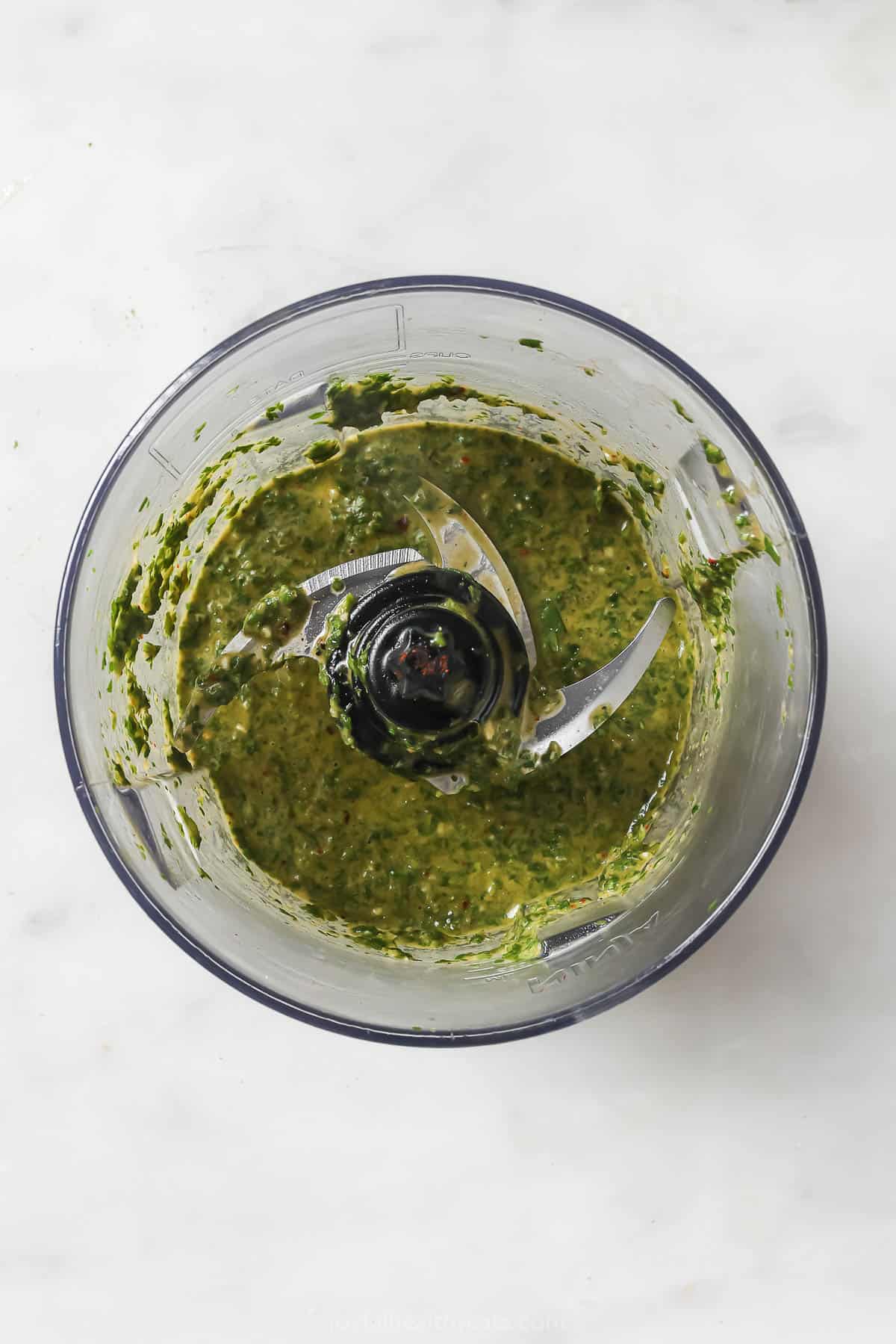 Blended chimichurri in the food processor. 