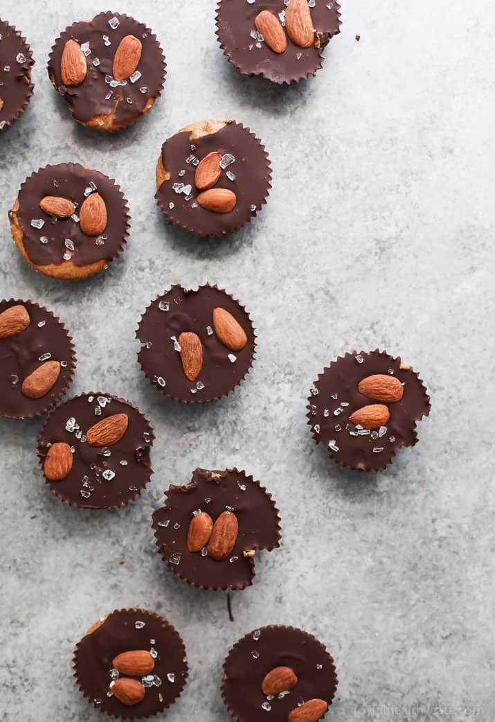 These 5 ingredient Vegan Almond Butter Cups are easy to make and a delicious healthy version of the popular candy! Creamy almond butter smooshed in between two layers of dark chocolate, can't get any better than that!
