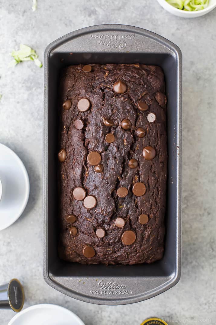 Whole chocolate zucchini loaf in the loaf pan. 