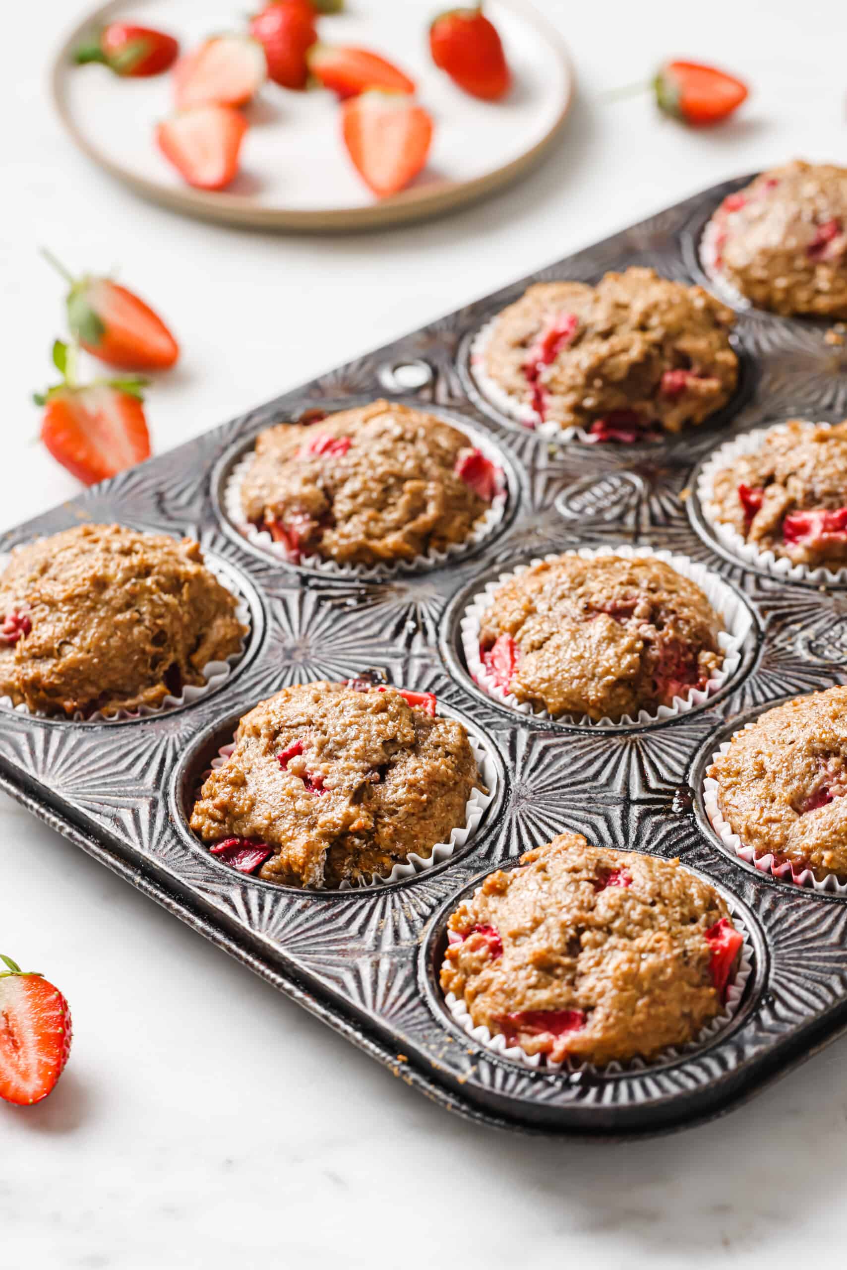 Baked muffins in the muffin tray. 