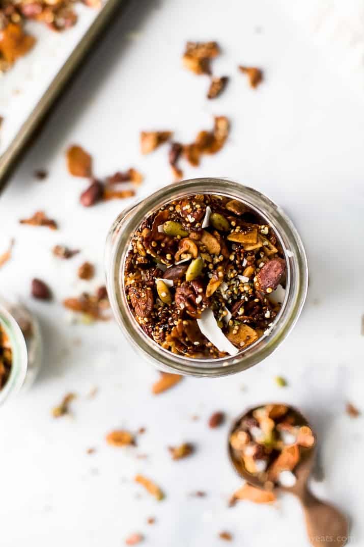 Simple Gluten Free Granola made with nuts, quinoa and toasted coconut. This homemade granola is refined sugar free and loaded with tasty goodness. It's makes the perfect start to your day or mid-day snack!