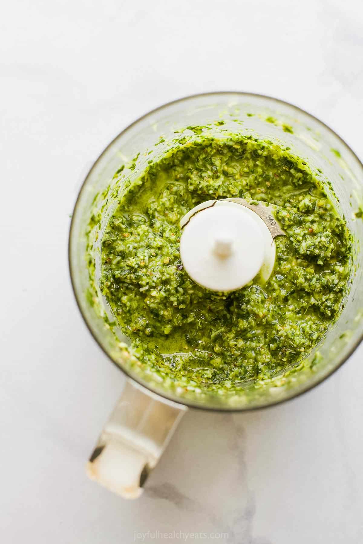 picture of basil pesto in a food processor