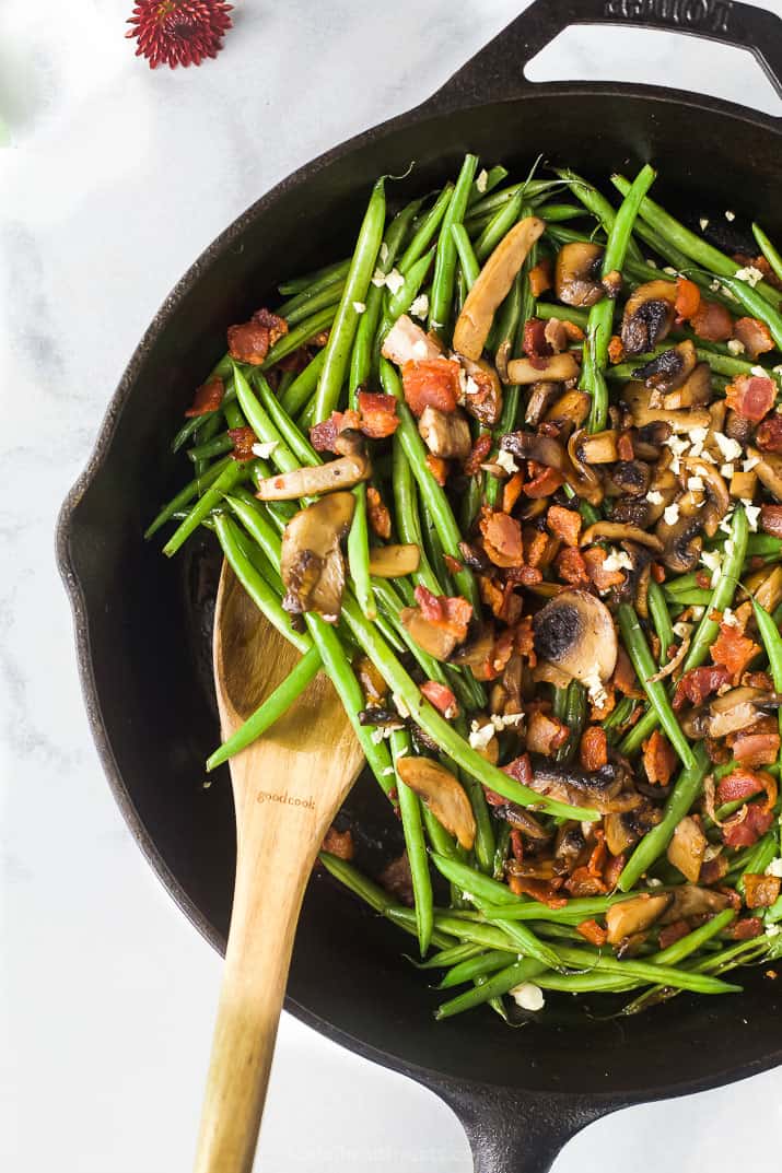 Green bean casserole in a skillet before adding fried shallots.