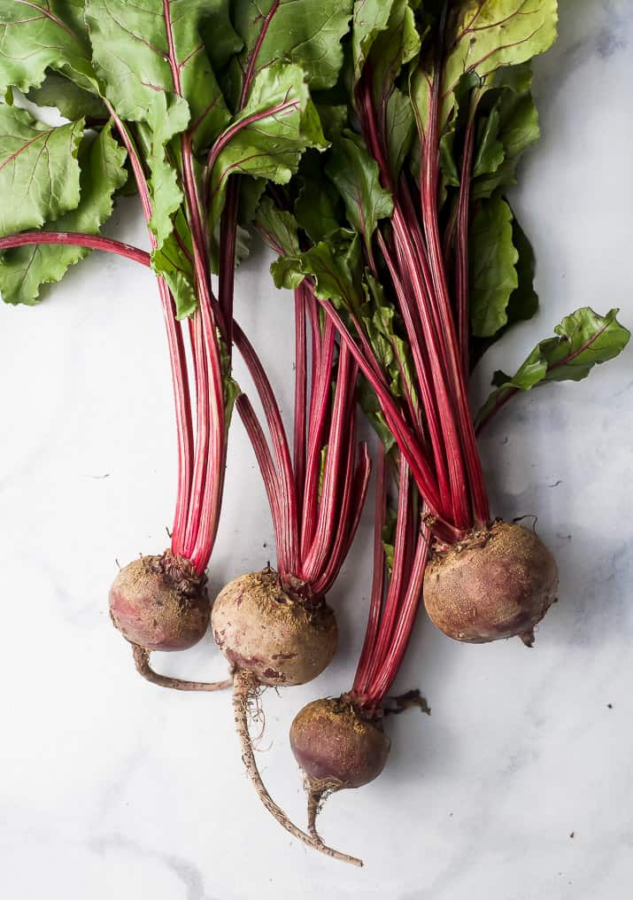 raw beets on a board