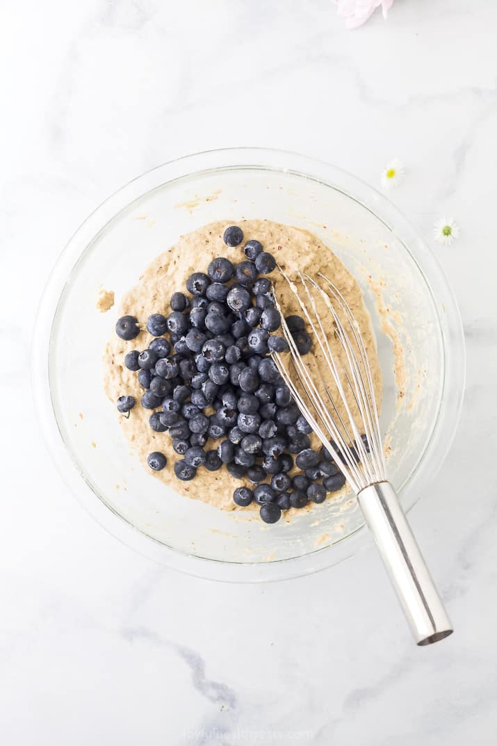 healthy vegan pancake batter with blueberries in a bowl