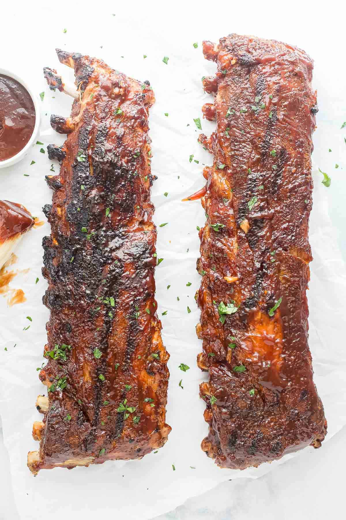 Two full racks of tender, grilled ribs. 