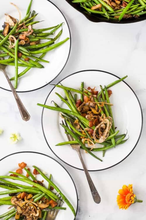 Healthy green bean casserole served on plates.