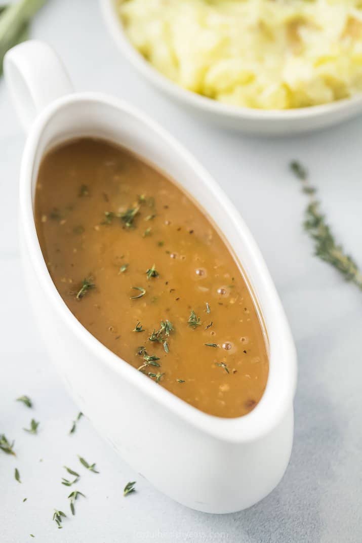 This easy brown gravy is made without drippings and can be made ahead of time! A smooth, garlicky gravy that's ready in only 15 minutes. gravy in a gravy boat