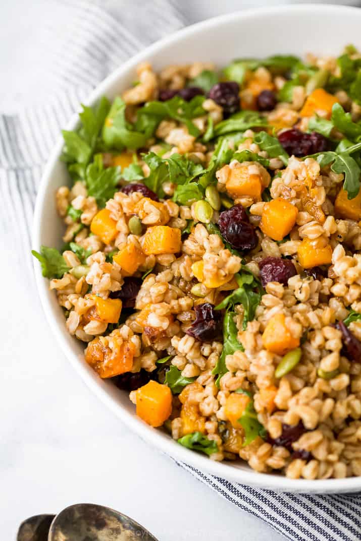 Close-up of the farro salad with sweet butternut squash, cranberries, arugula, and crunchy pepitas.