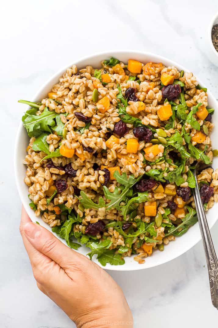 Bowl of farro salad with homemade maple-Dijon dressing.