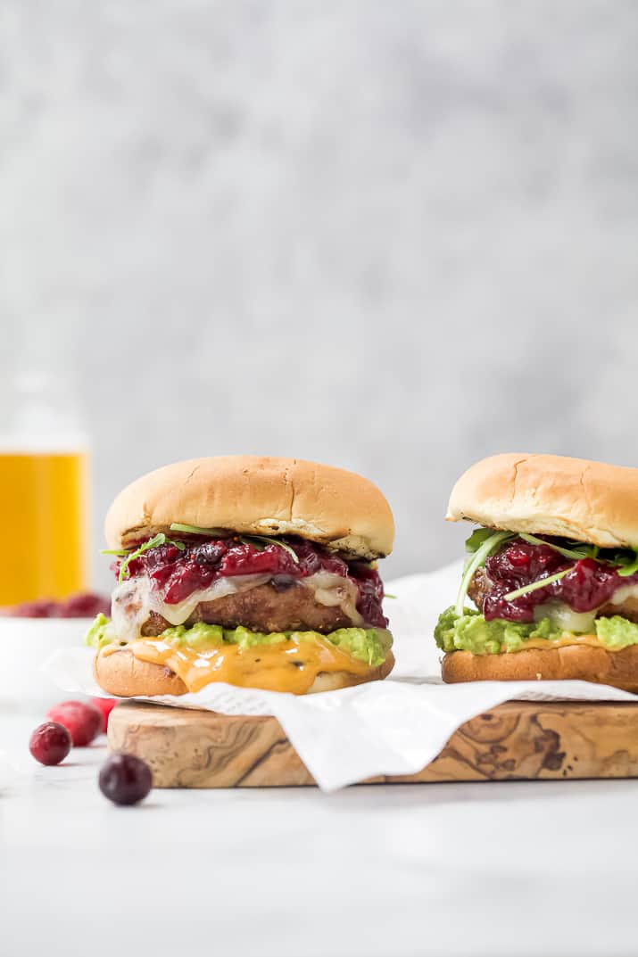 avocado turkey burger topped with cranberry chutney