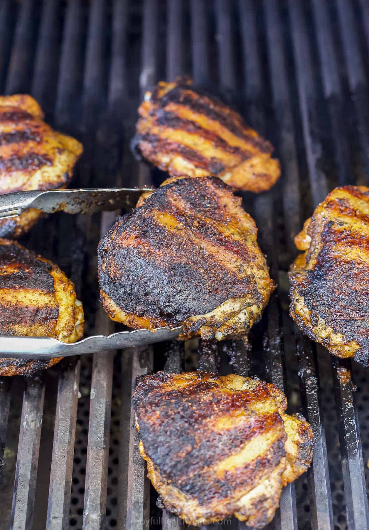 spice rubbed chicken thighs on the grill