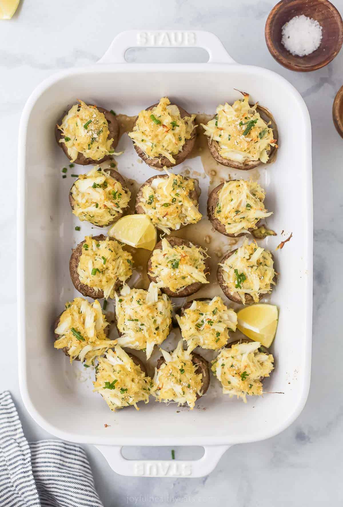 stuffed mushrooms in a casserole dish