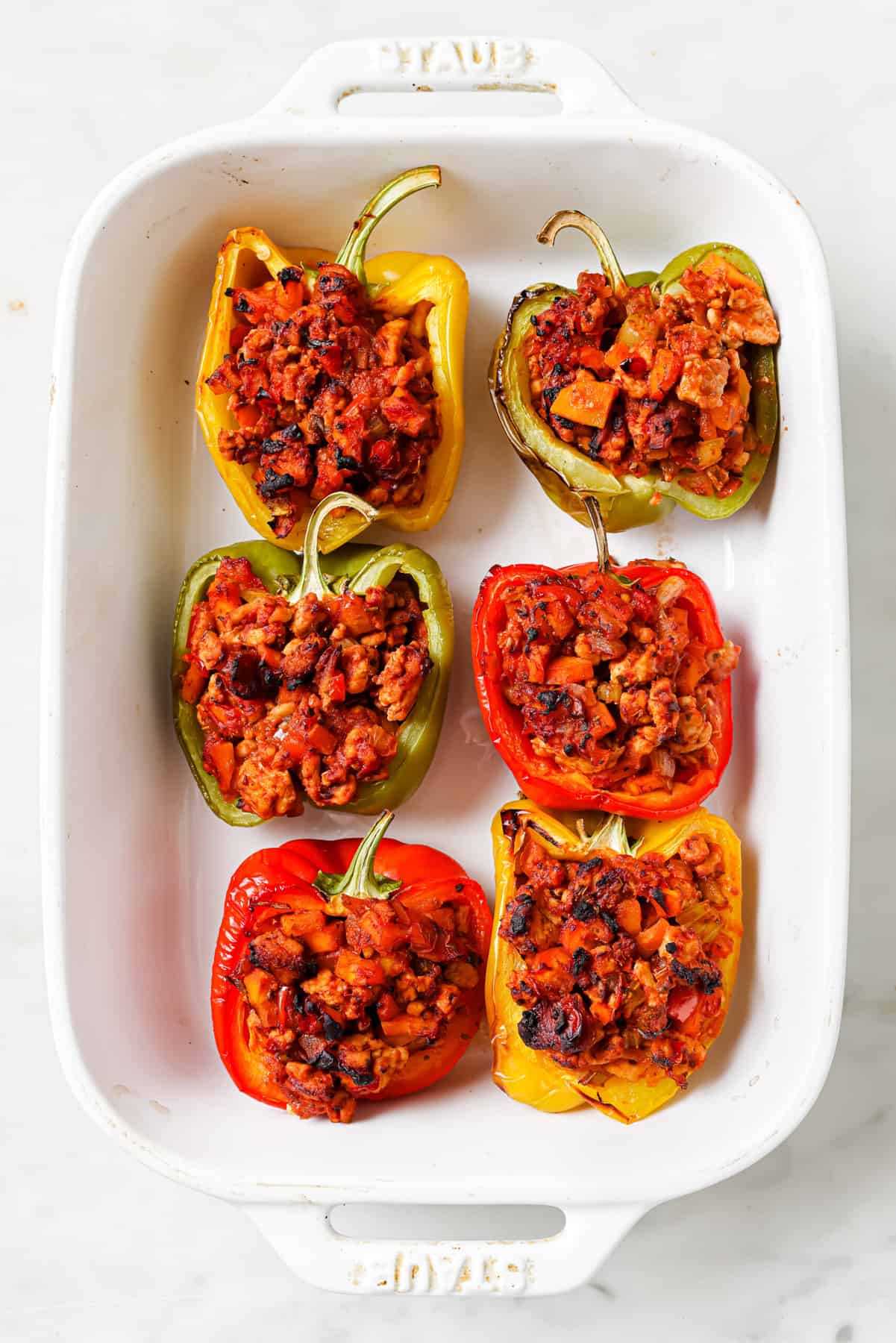 Stuffed peppers in dish